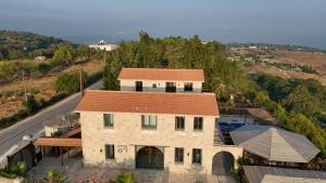 an aerial view of a house with a road at LasaThea in Lasa