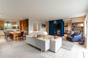 a living room with a couch and a table at LITZKOW 14205 in Morsum