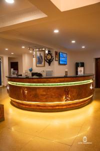 a large wooden boat sitting in a room at Hotel Lubumbashi Golf in Lubumbashi +35 photos