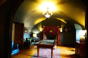 a room with a pool table in the middle of it at Dalston Hall in Carlisle +271 photos