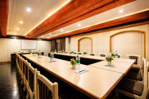 a conference room with a long table and chairs at Ashish Palace - A City Centre Hotel in Udaipur