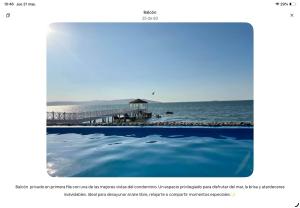 a page of a website with a view of the ocean at Ocean View Apartment Beach Pools Pier & Lift in Paracas