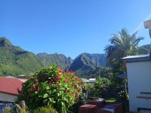 a view of the mountains from a house at Bungalow P&P in Entre-Deux