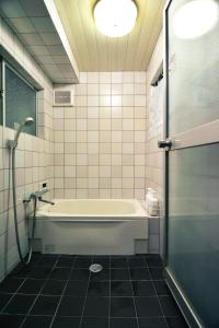 Een badkamer bij Guest House Bokuyado