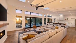 a living room with a couch and a fireplace at Olive Oak by AvantStay in Glen Ellen