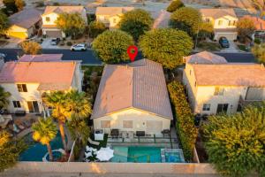 an aerial view of a house with a red heart on the roof at Walk to the Festivals - Private Pool & Spa in Indio
