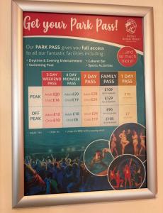a poster on the wall of a park pass sign at 2 bedroom, robin Hood rhyl in Rhyl