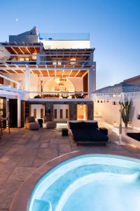 a swimming pool in the middle of a building at Captain Zeppos in Pollonia