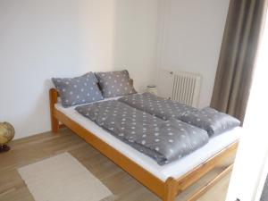 Posteľ alebo postele v izbe v ubytovaní Balokány apartman