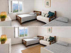 a room with two beds and a couch and windows at Georgoulis Home in Ambelókipoi