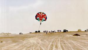 a kite in the middle of a desert at Jaisalmer Sand Dunes Resort in Jaisalmer