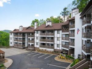 an aerial view of a building with a parking lot at Turkey Nest by Beyond Expectations Renovated 2BR in Gatlinburg