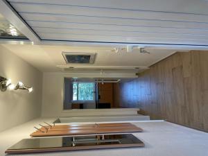 a living room with a sink and a ceiling at Haus Roland, Wohnung 16 in Zinnowitz