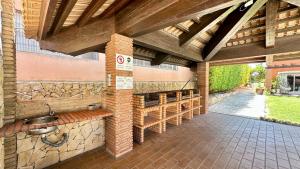 an outdoor patio with a sink and a brick wall at Santa Maria N - Shared Pool - 8 Guests - Albufeira in Albufeira +22 photos