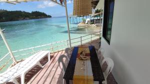 a view of the ocean from the balcony of a boat at Anchor Doods in Romblon