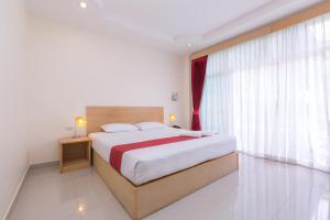 Postel nebo postele na pokoji v ubytování Zing Resort & Spa