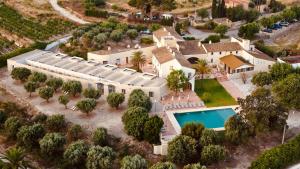 an aerial view of a house with a swimming pool at Finca Olivar Country Boutique Hotel in Benissa +75 photos