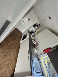 an overhead view of a kitchen in an rv at The View in Leysdown-on-Sea