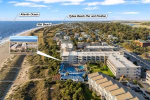 an aerial view of a resort on the beach at The Gardens 703 in Tybee Island +5 photos