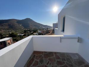 a view from the balcony of a house at Apollonia Studios in Katapola +8 photos