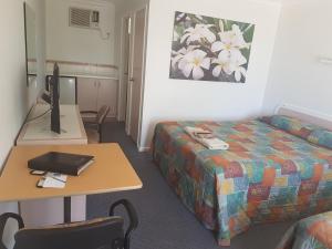 Postel nebo postele na pokoji v ubytování Carnarvon Gateway Motel