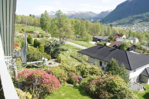 a view of a house with a roof at Engeset Villa in Volda