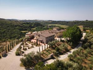an aerial view of a house with trees at The Podere Wine Resort Chianti in Barberino di Val dʼElsa