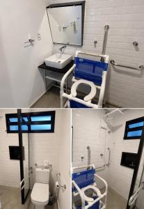 a bathroom with a toilet and a sink and a mirror at Requinte Hotel in São Paulo