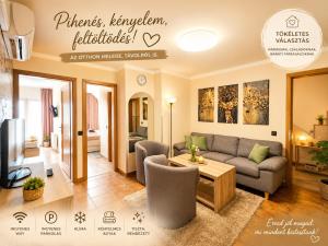 a living room with a couch and a table at Apartman Siesta Bük - Bükfürdő in Bük +136 photos
