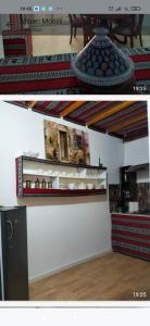 two pictures of a room with a counter and a table at Relax in Tunis
