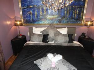 Cama o camas de una habitación en Art Of Dreams Deluxe 4 stars