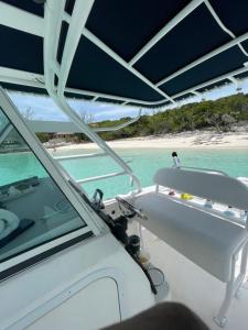 a view from the bow of a boat in the ocean at 4 Island Boat Tour in Nassau