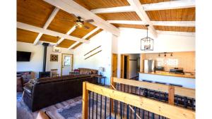 a view of the living room and kitchen of a house at Aspen Hideaway in Red River