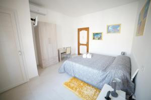 Postel nebo postele na pokoji v ubytování La Casa dei Sogni