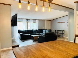 a living room with a couch and a table at Put-in-Bay Island Club #71 in Put-in-Bay +25 photos