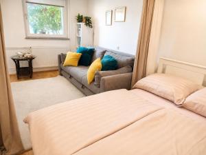a living room with a couch at Grandma's Corner in Štore