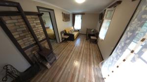 an aerial view of a living room with a fireplace at Zartak cottage in Dilijan