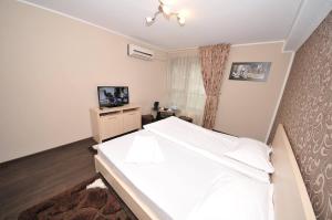 โทรทัศน์และ/หรือระบบความบันเทิงของ DNY Comfort Apart
