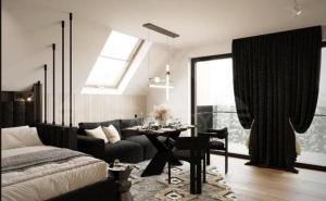 a living room with a bed and a table and a couch at INCOGNITO Basen & SPA widok na góry in Białka Tatrzańska +29 photos