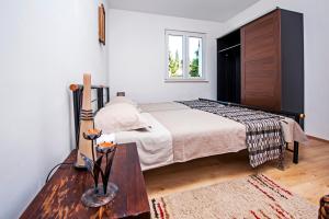 Een bed of bedden in een kamer bij Pimlico Apartment