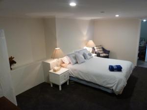 Ένα ή περισσότερα κρεβάτια σε δωμάτιο στο Panorama on Sorell B&B