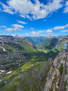 a view of the mountains from the top of a mountain at Quiet Valley Tomrefjord in Vestnes
