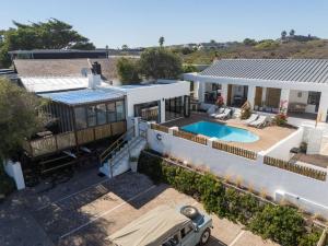 an aerial view of a house with a swimming pool at Coast Unit 5, Bright Escape By Langebaan Lagoon in Langebaan +21 photos