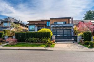 a house with a garage in a residential neighborhood at Sunnywood Garden in Richmond
