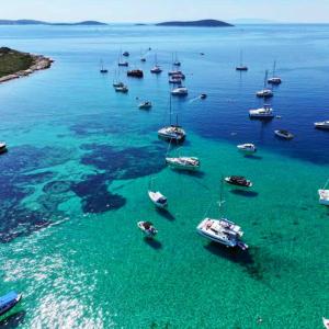 an aerial view of a group of boats in the water at Gea Maris Apartment in Kaštela