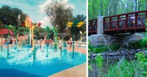 a group of people playing in a water park at Sterling Heights Retreat ! in Sterling Heights
