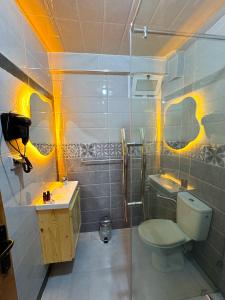 a bathroom with a toilet and a sink at Taghazout Life in Taghazout +31 photos