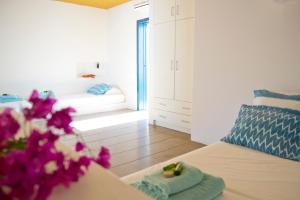 Postel nebo postele na pokoji v ubytování Hidesign Athens Villa In Sounio