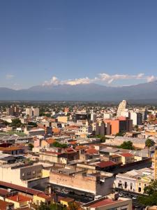 a view of a city with mountains in the background at Hotel Alejandro I, Affiliated by Meliá in Salta
