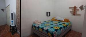 a baby sleeping on a bed in a room at Habitacion Amatitlan in Amatitlán